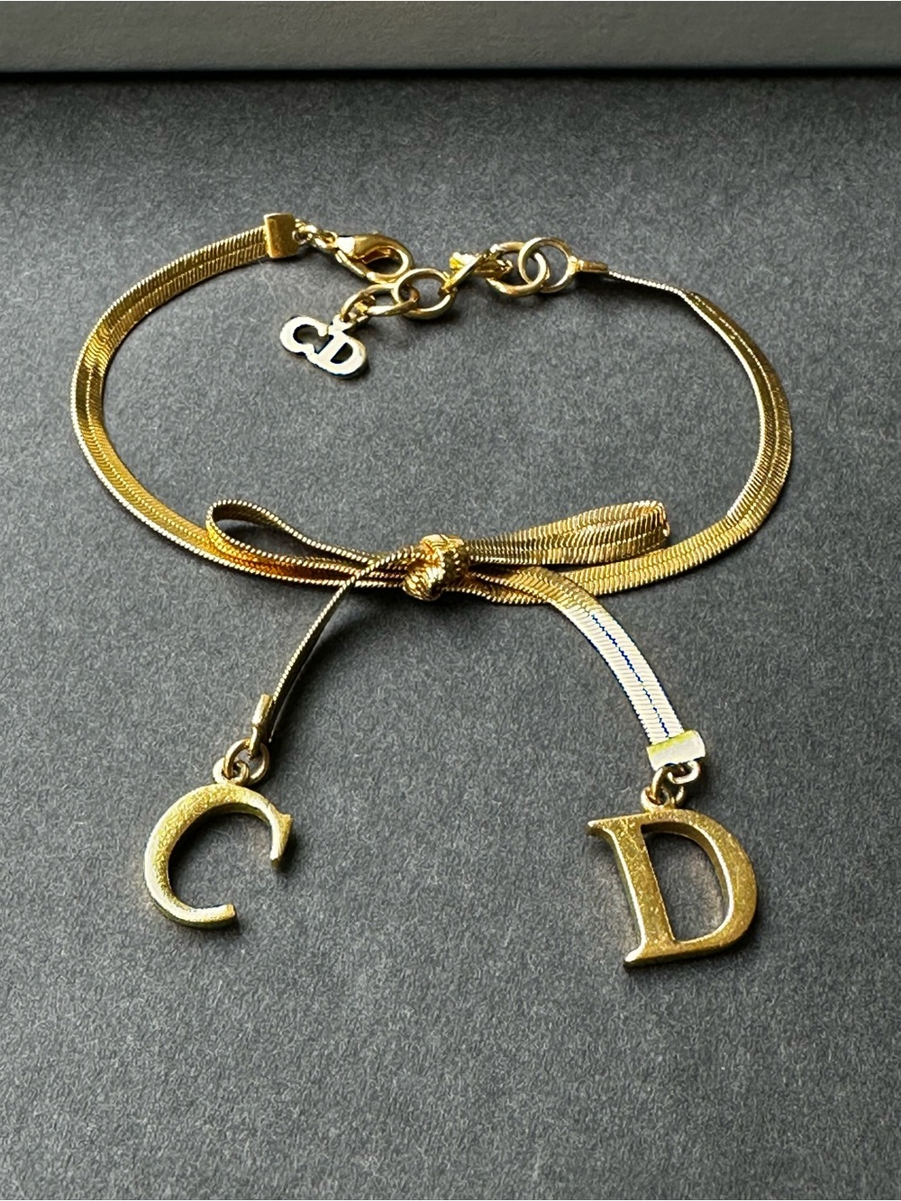 Vintage Christian Dior CD Ribbon Bracelet Gold Tone Y2K Galliano Era with Box